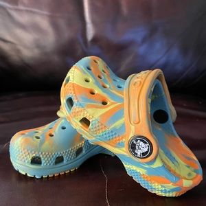 Multi-colored baby’s Crocs